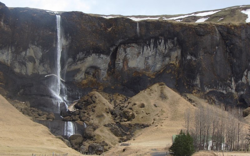 A waterfall between Vik and Vatnajökull National Park