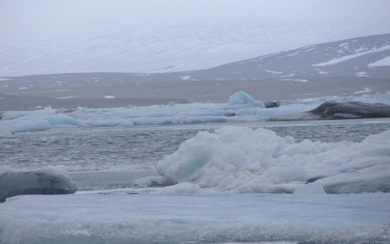 Walking around the shore of Jökulsárlón glacier lagoon, Iceland